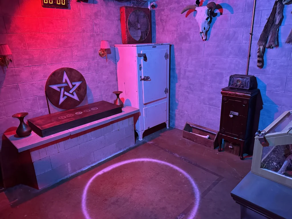 Haunted basement escape room filled with eerie relics, supernatural puzzles, and dark secrets