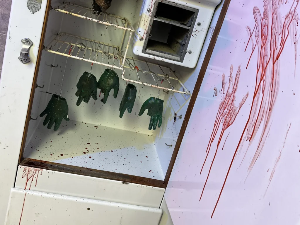 Haunted basement escape room filled with eerie relics, supernatural puzzles, and dark secrets