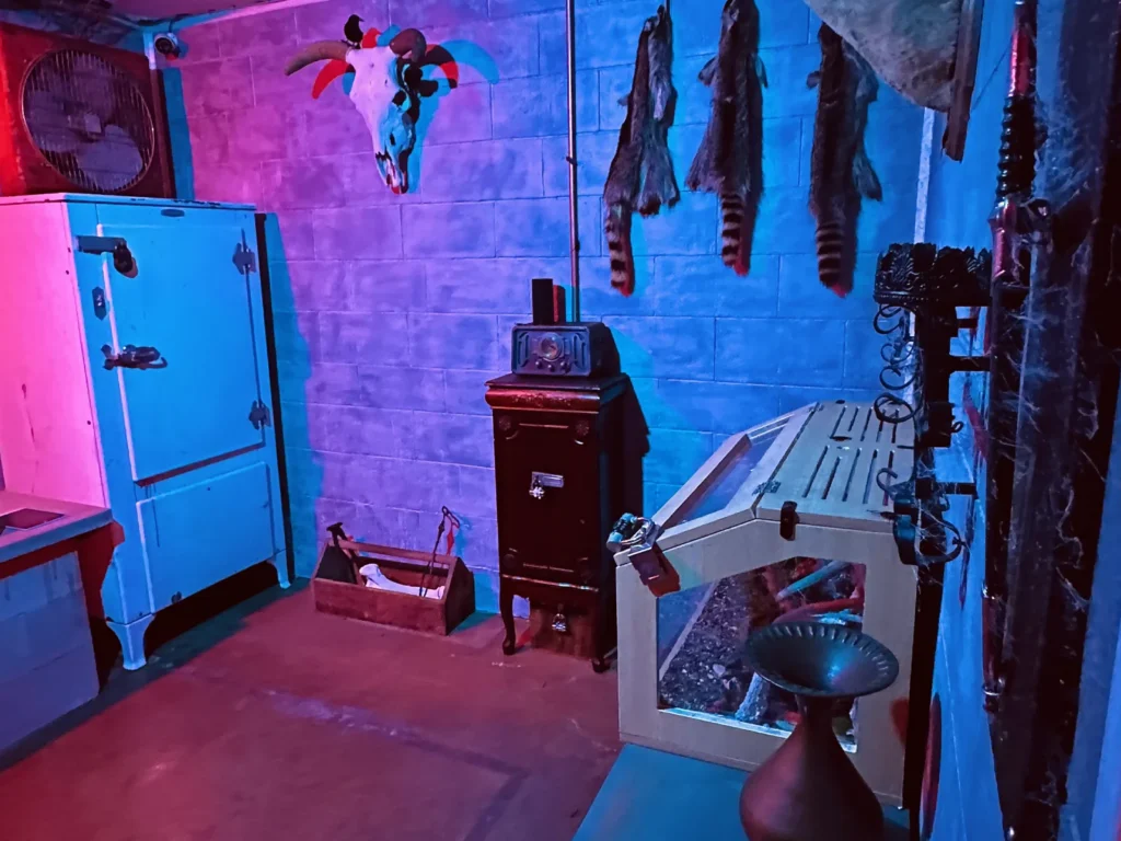 Haunted basement escape room filled with eerie relics, supernatural puzzles, and dark secrets
